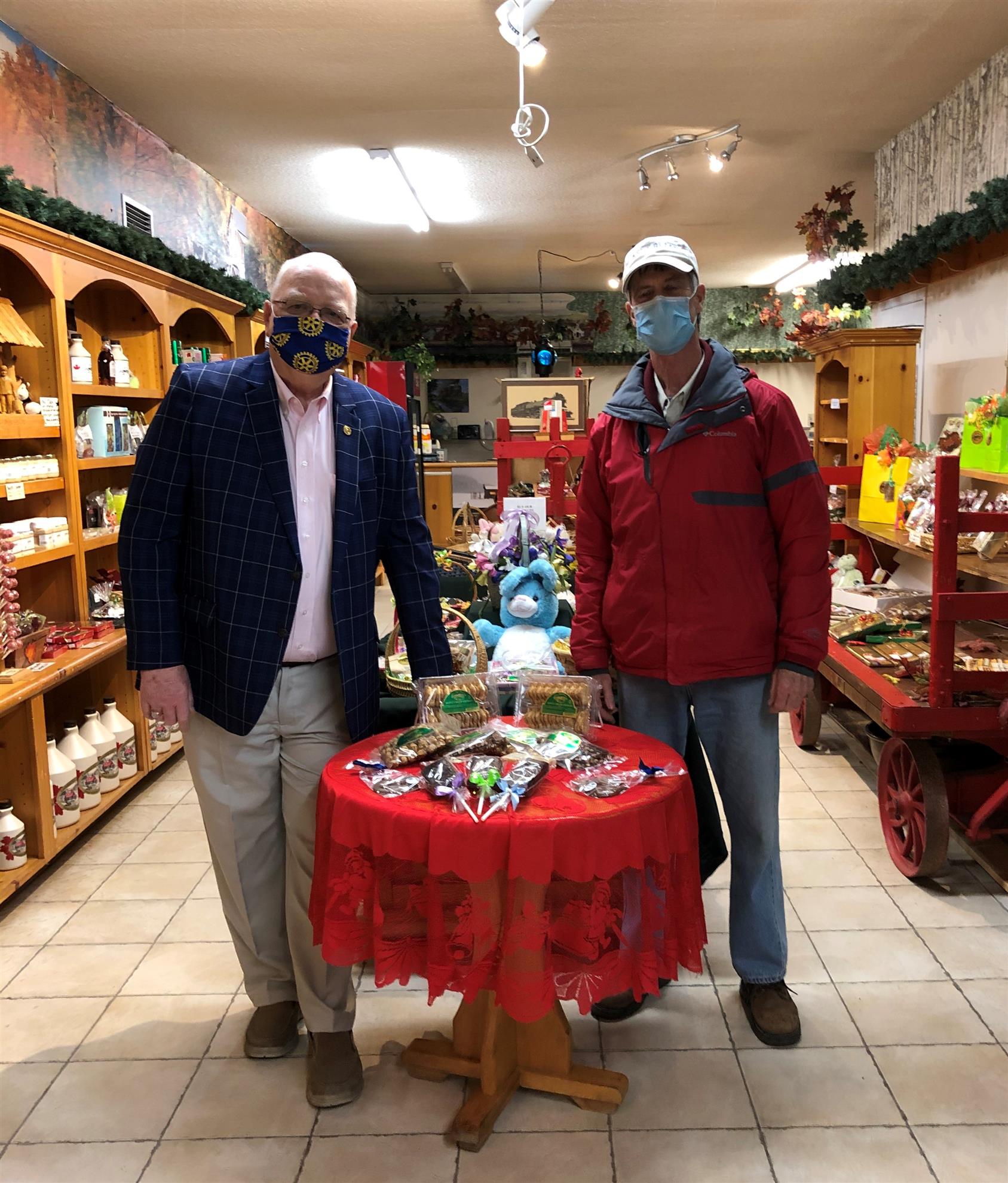 Photo of Club Member Paul Hammond and Dennis Grenier, Volunteer from Manna Food Bank