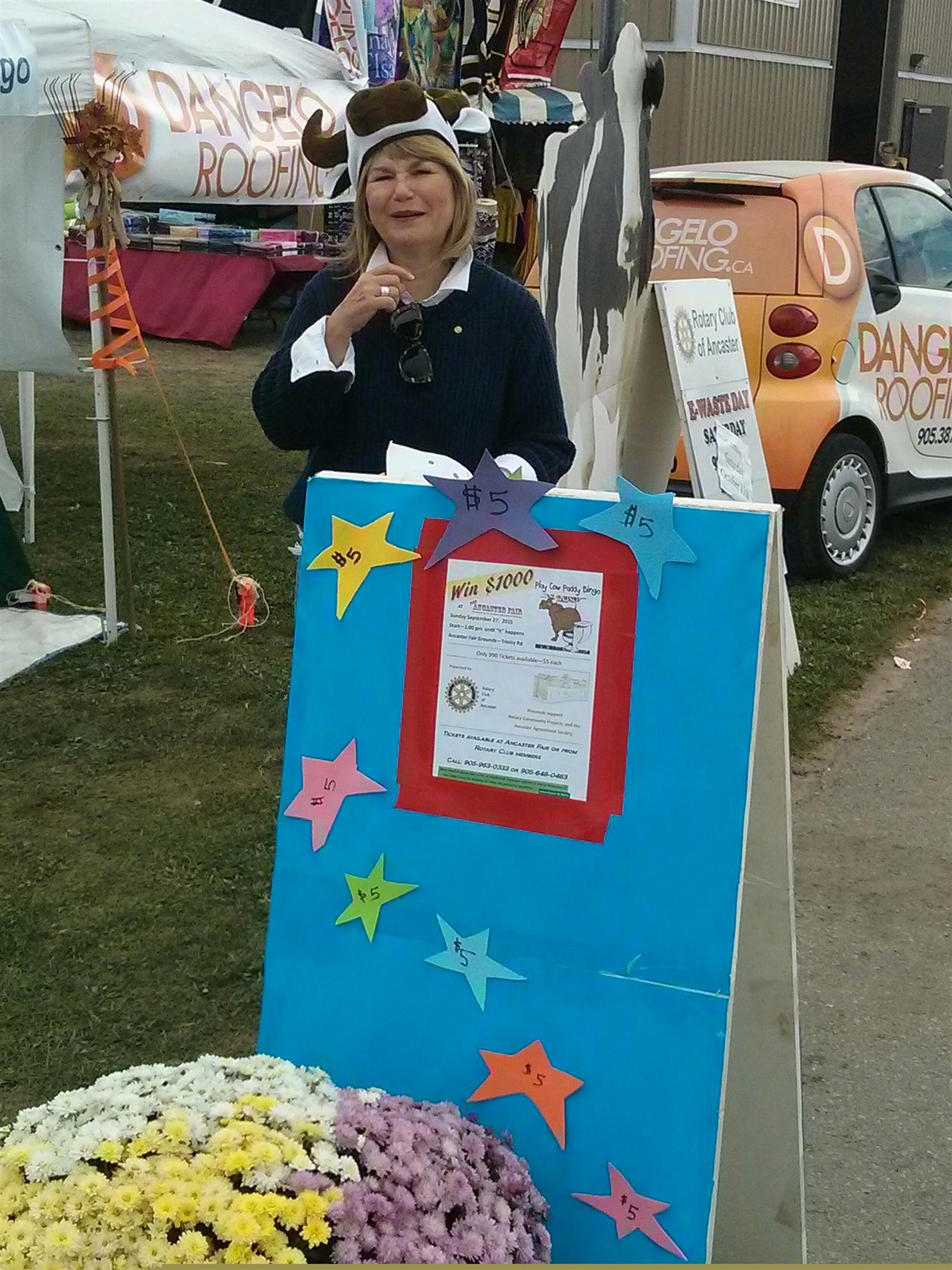 Kathy at Cow Paddy Bingo booth selling tickets
