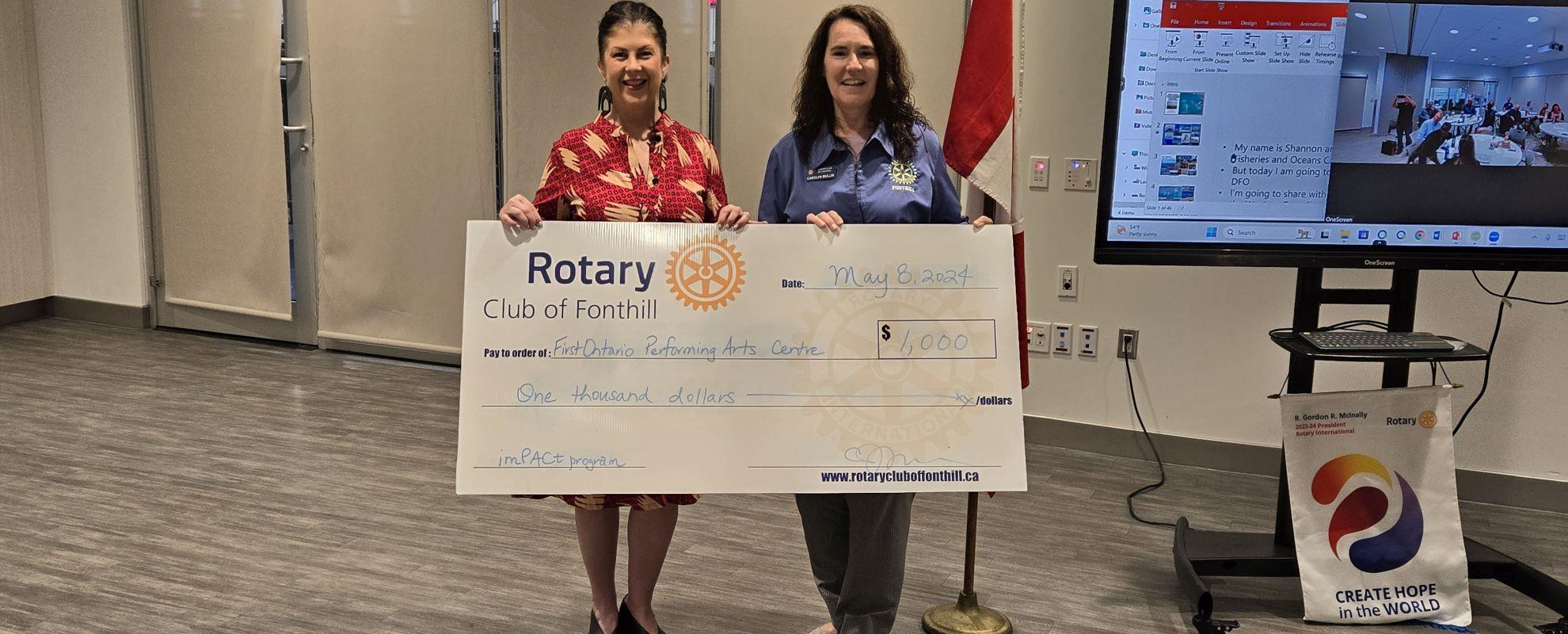 President Carolyn presents cheque to Colleen Smith for PAC imPACt program