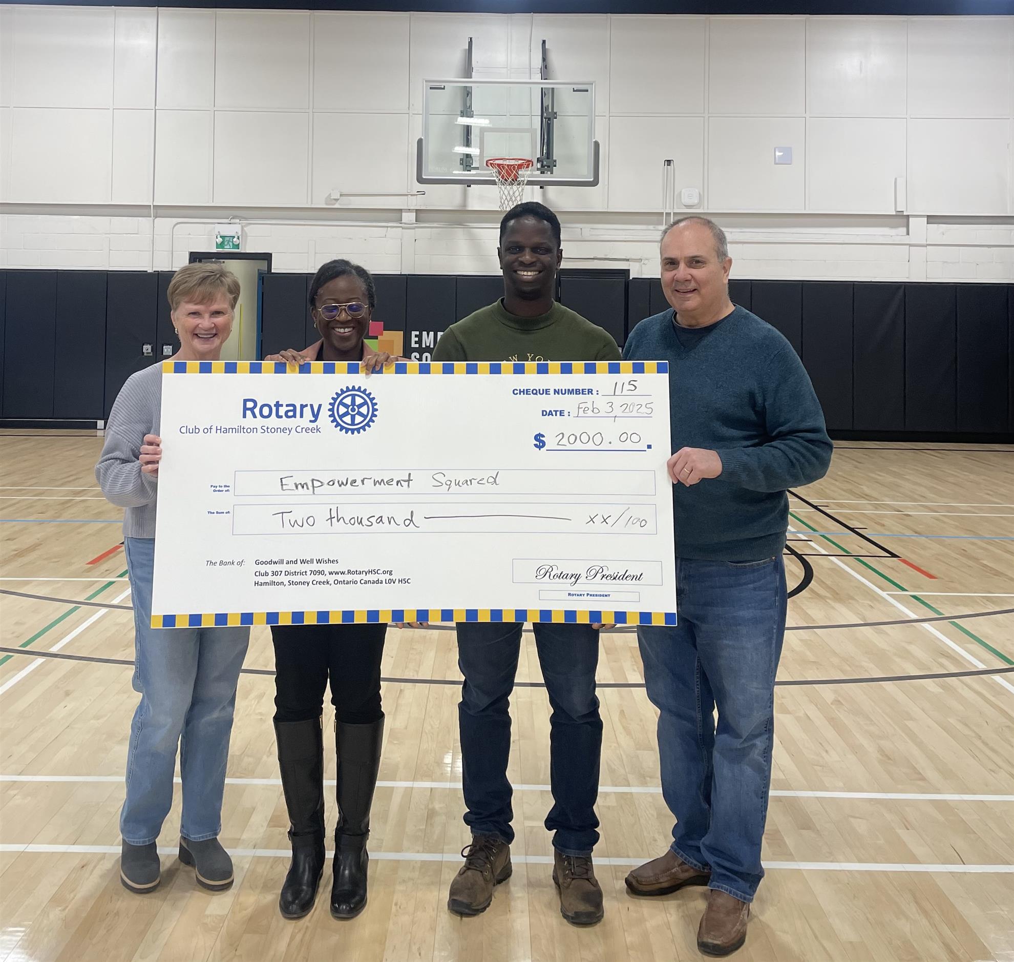 Rotary HSC - Presenting Empowerment Squared with a cheque