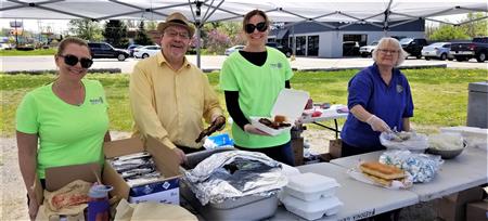 Rotarians Serving Barbecue