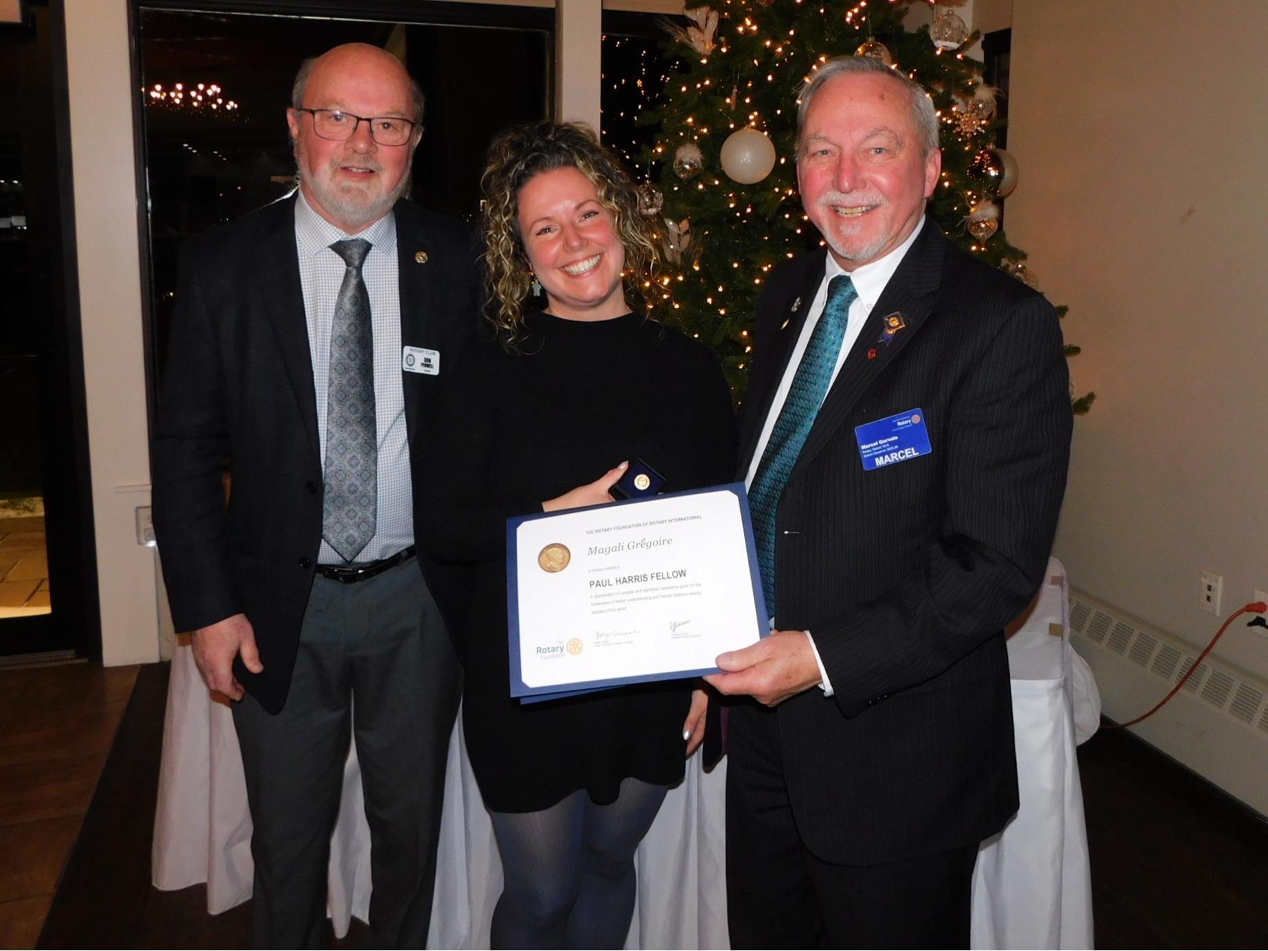 Left to right: Awards Event Chair. Don Penwell, Paul Harris Fellow Magali Grégoire and Rotary District North Atlantic Governor Marcel Gervais