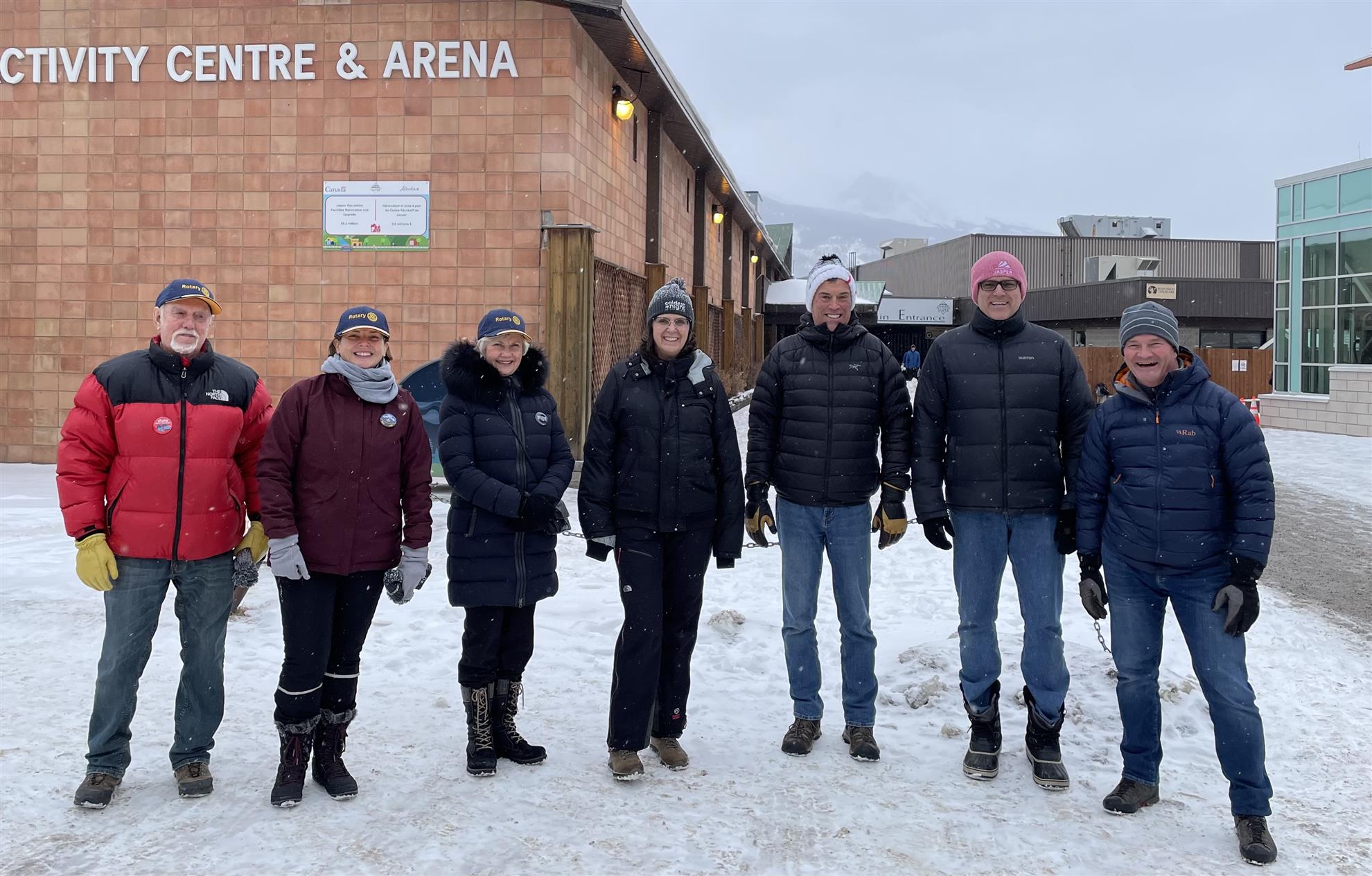 Rotarians gather outside the Jasper Activity Centre in winter