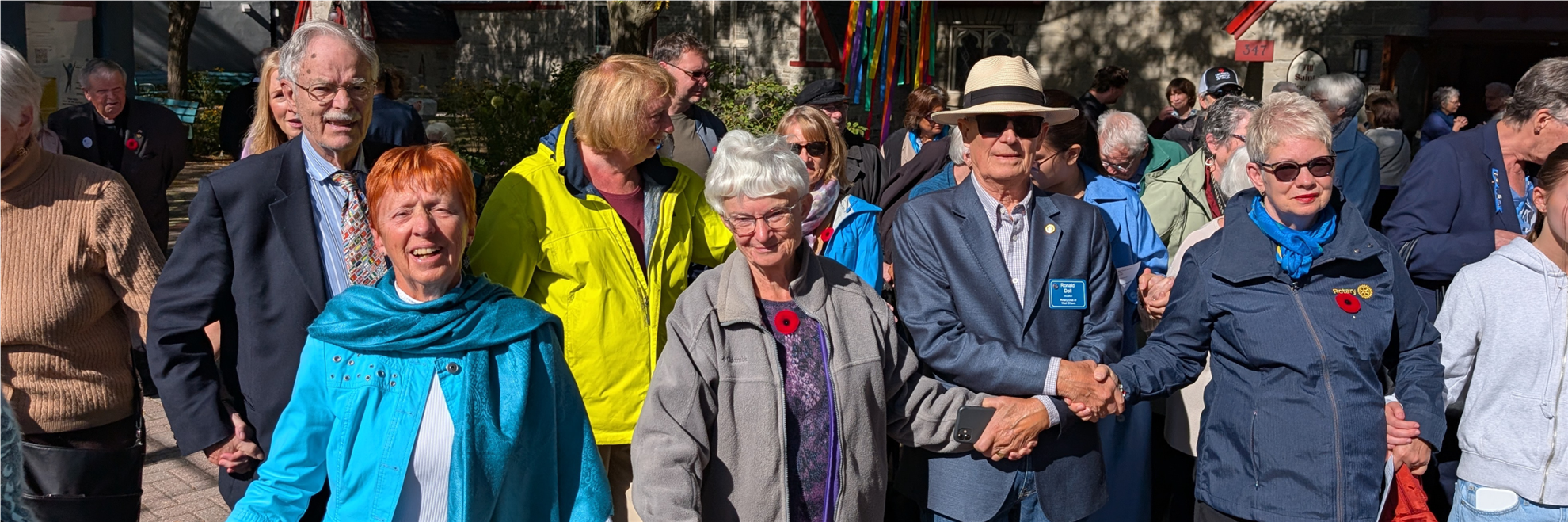 Gathering at our new Peace Pole, 2025