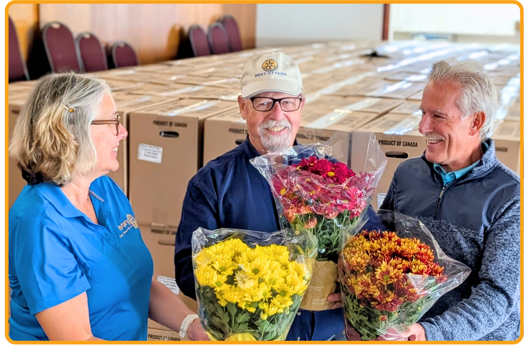 Rotary volunteers with mums ready for delivery.