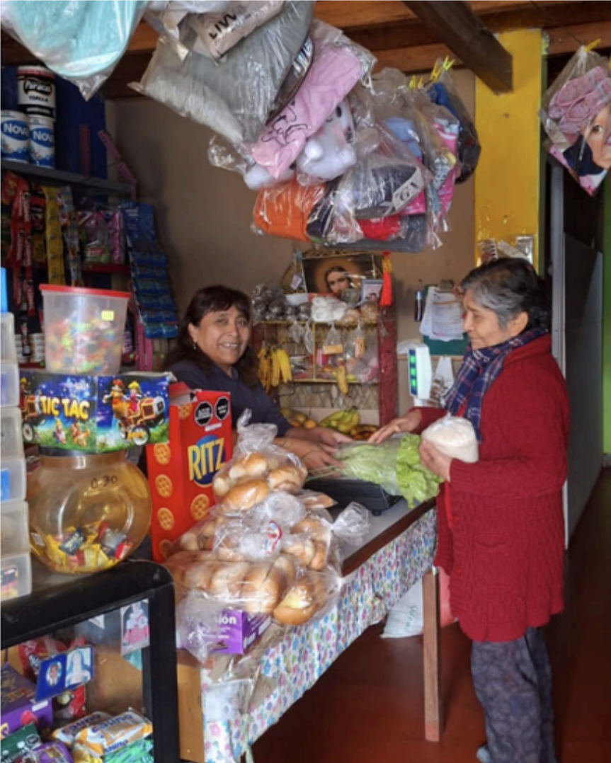 Luisa at the small neighbourhood shop she runs from her home