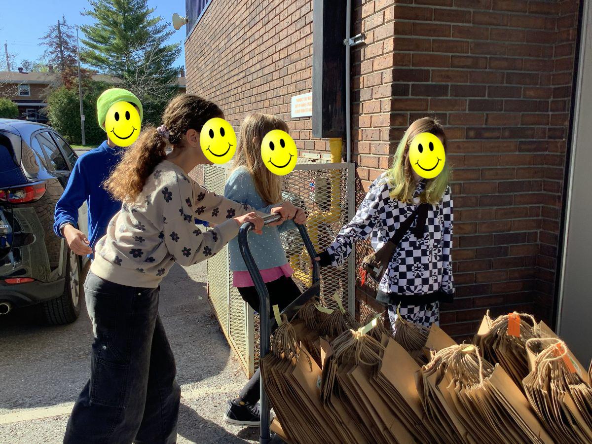 StoryBook Ottawa gift bags being delivered at Regina Street Alternative School