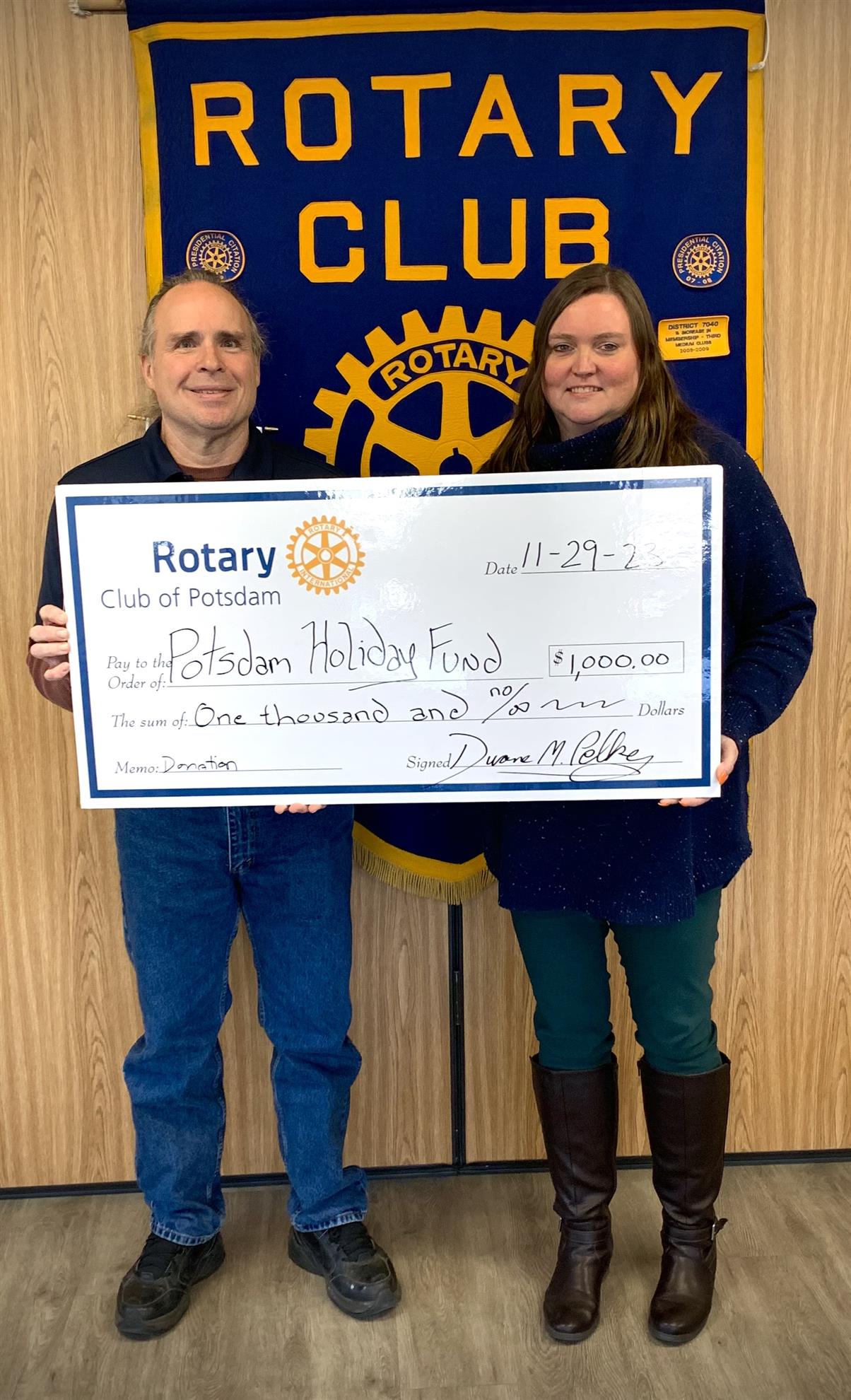 Potsdam Rotary Donates 1,550 in Cash & Books to Potsdam Holiday Fund