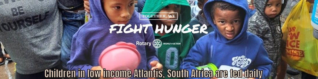 children-line-up-for-food--Atlantis-FIGHT-HUNGER---CAPTION.JPG