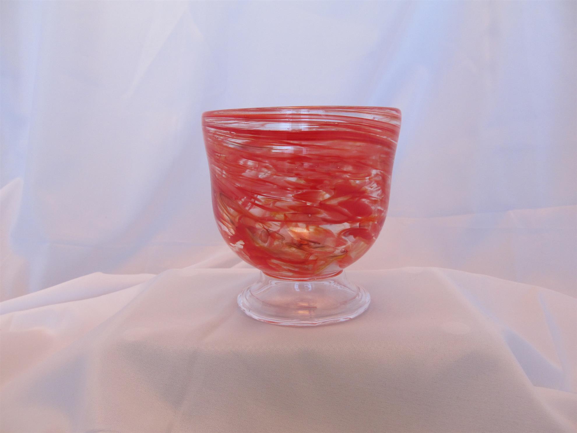 Hand blown candy dish with foot.