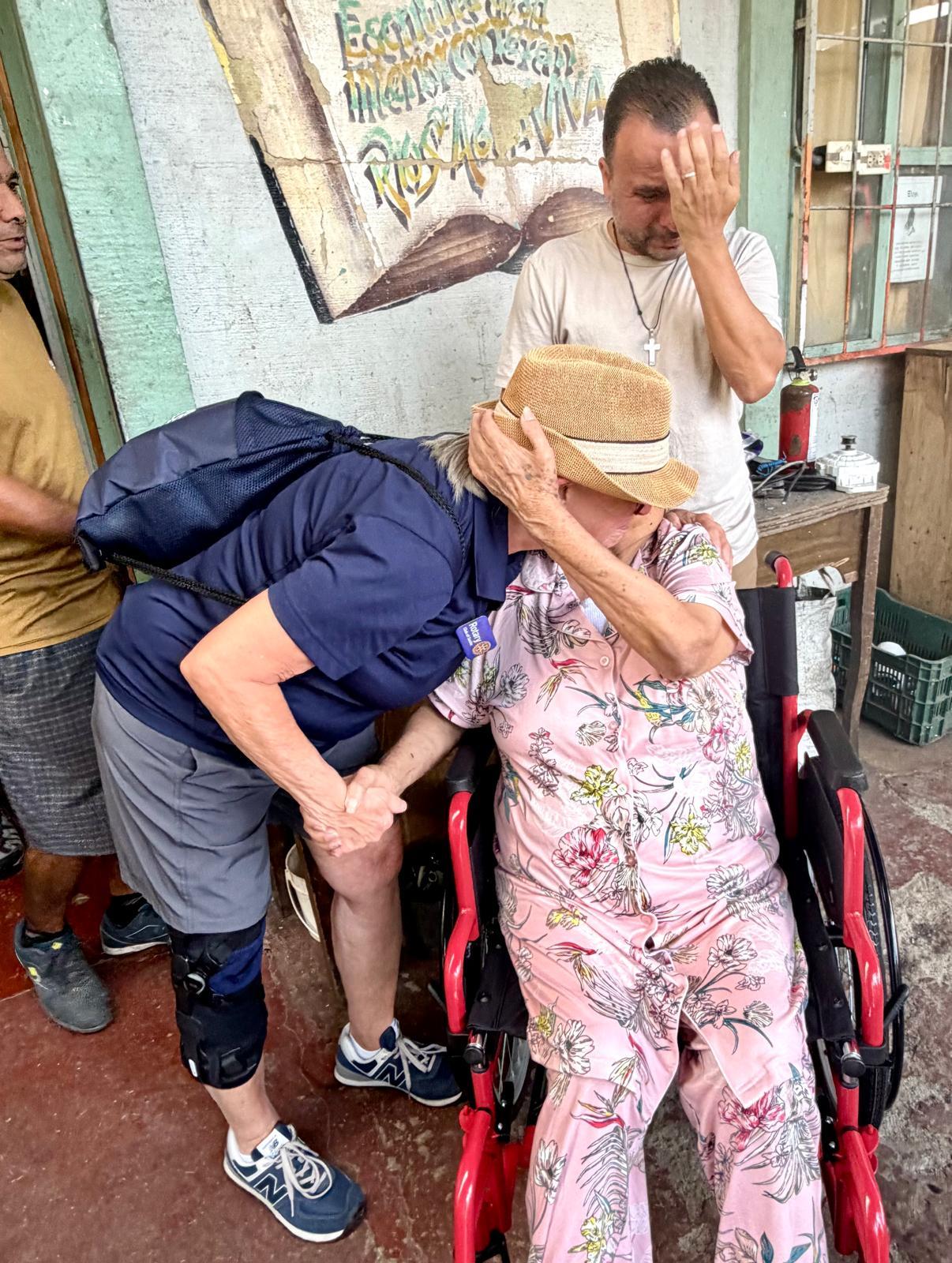 First wheelchair delivery. Hugs and tears.