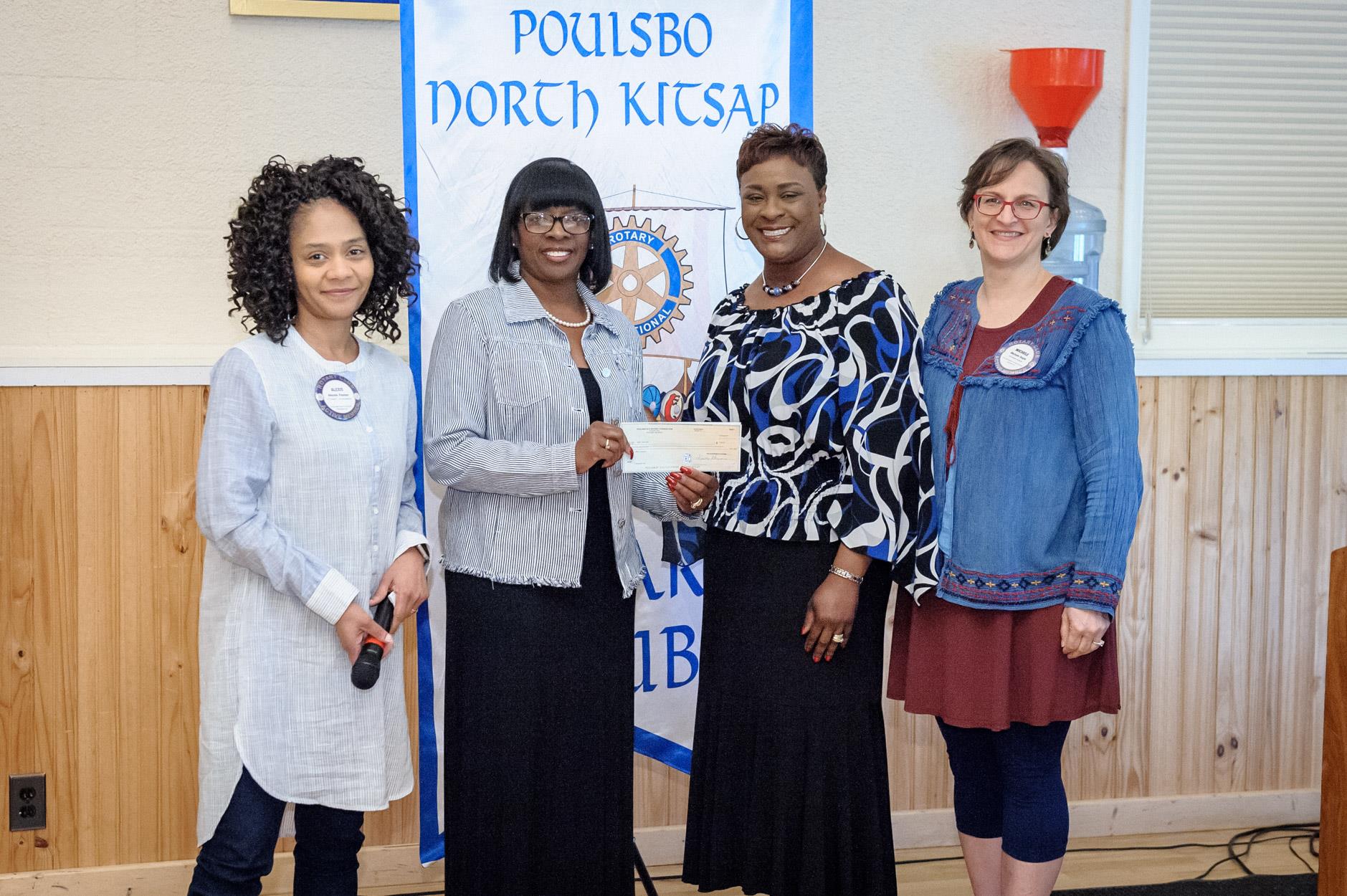 Harriet Bryant and Vicki Collins received a check for $500 for OurGEMs