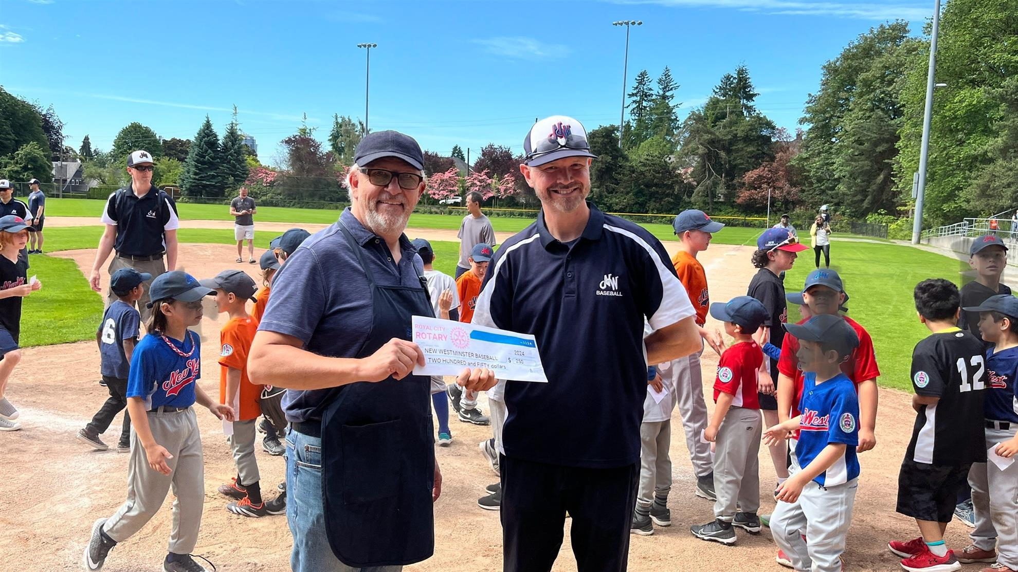 royalcityrotary.com-2024-NWBaseball-cheque-presentation.jpg