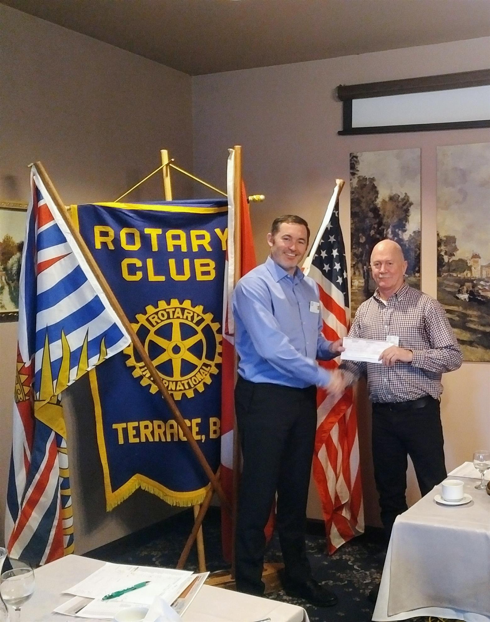 Spotless Dry cleaners employees donate to Rotary Splash Park