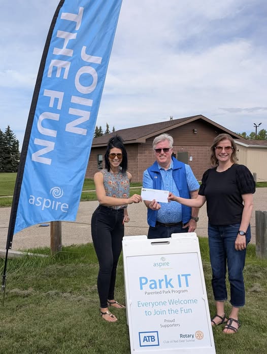 Cheque presentation to Aspire Child Development Centre