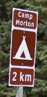 Turn down next driveway after this Camp Morton 2km sign