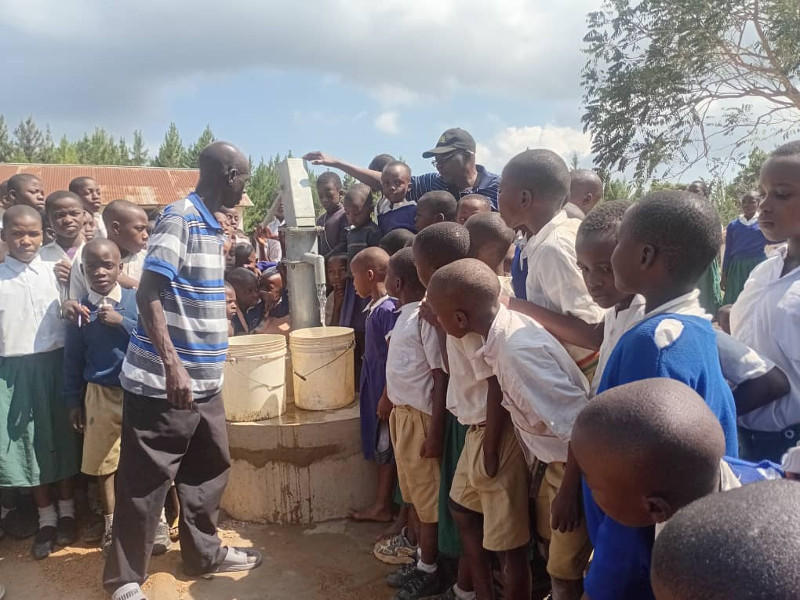 Ukerewe Students at a well