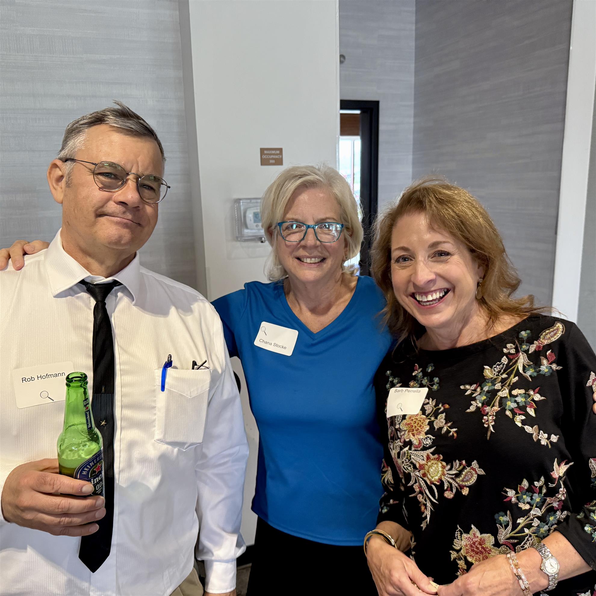 A group of people posing for a photoAI-generated content may be incorrect.