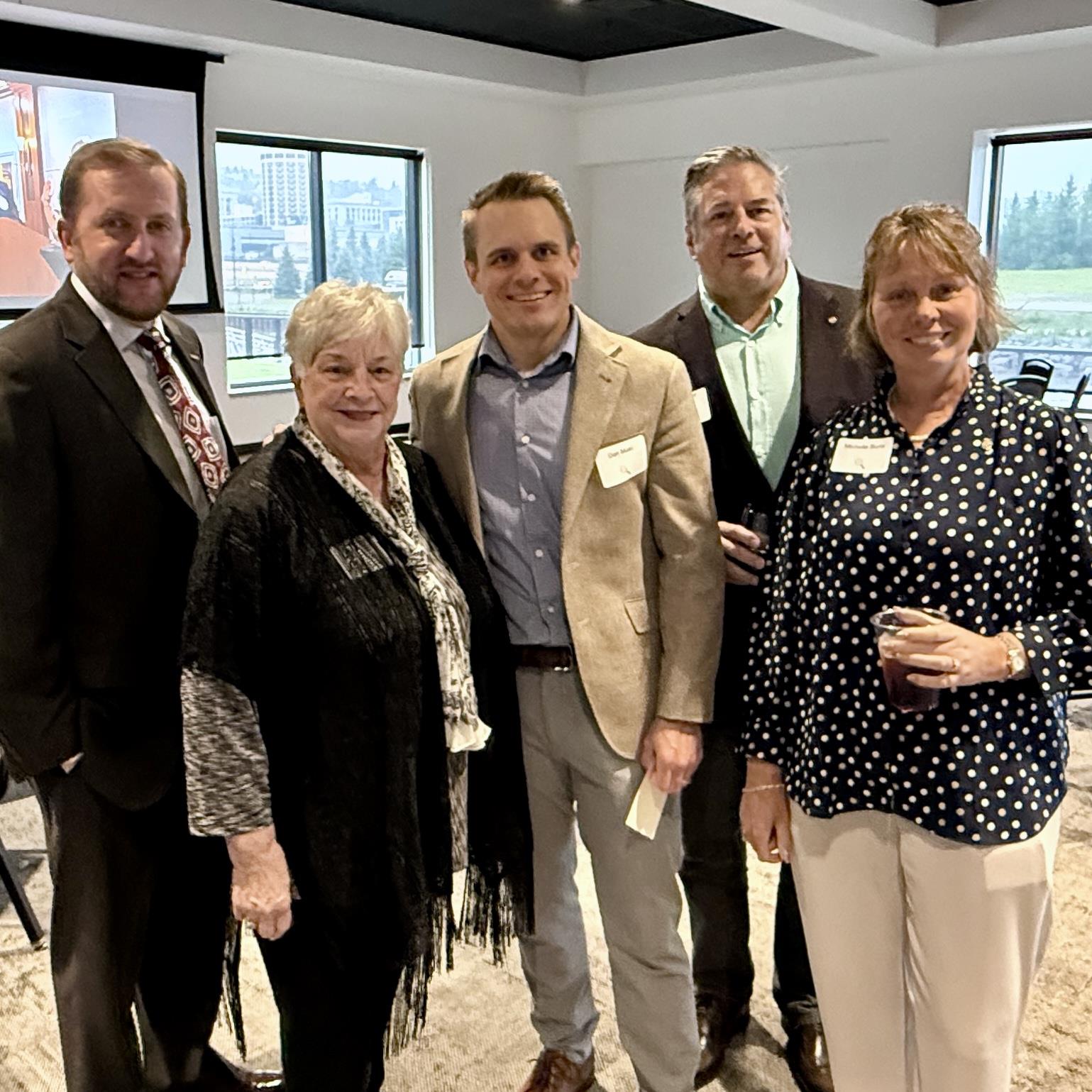 A group of people posing for a photoAI-generated content may be incorrect.