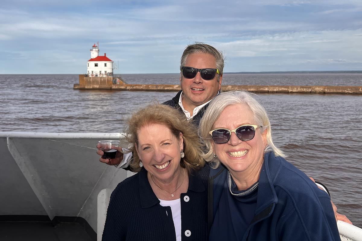 A group of people posing for a photoDescription automatically generated