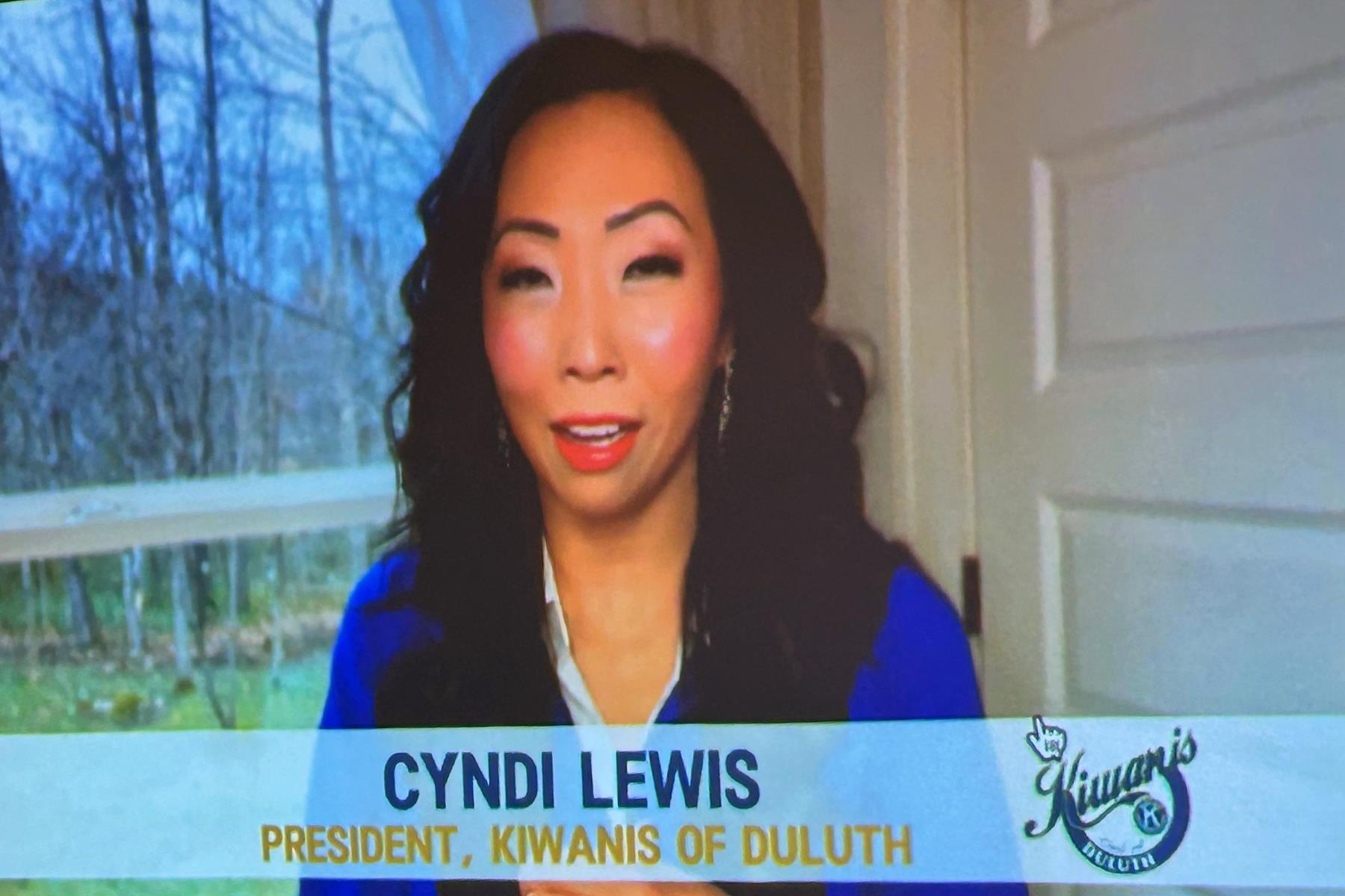 A person on a television screenDescription automatically generated
