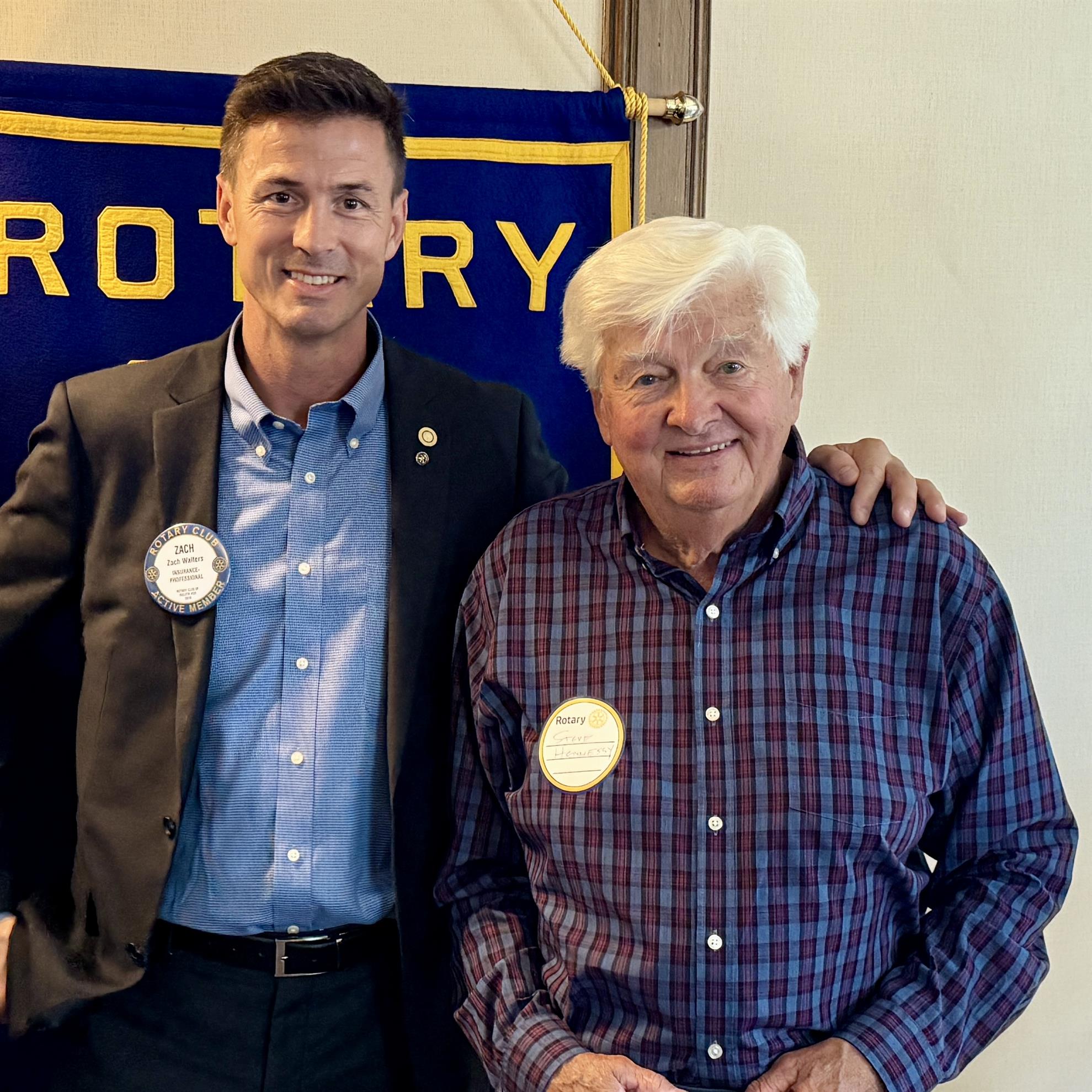 A person standing next to a personAI-generated content may be incorrect.