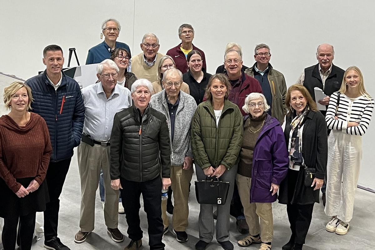 A group of people posing for a photoDescription automatically generated