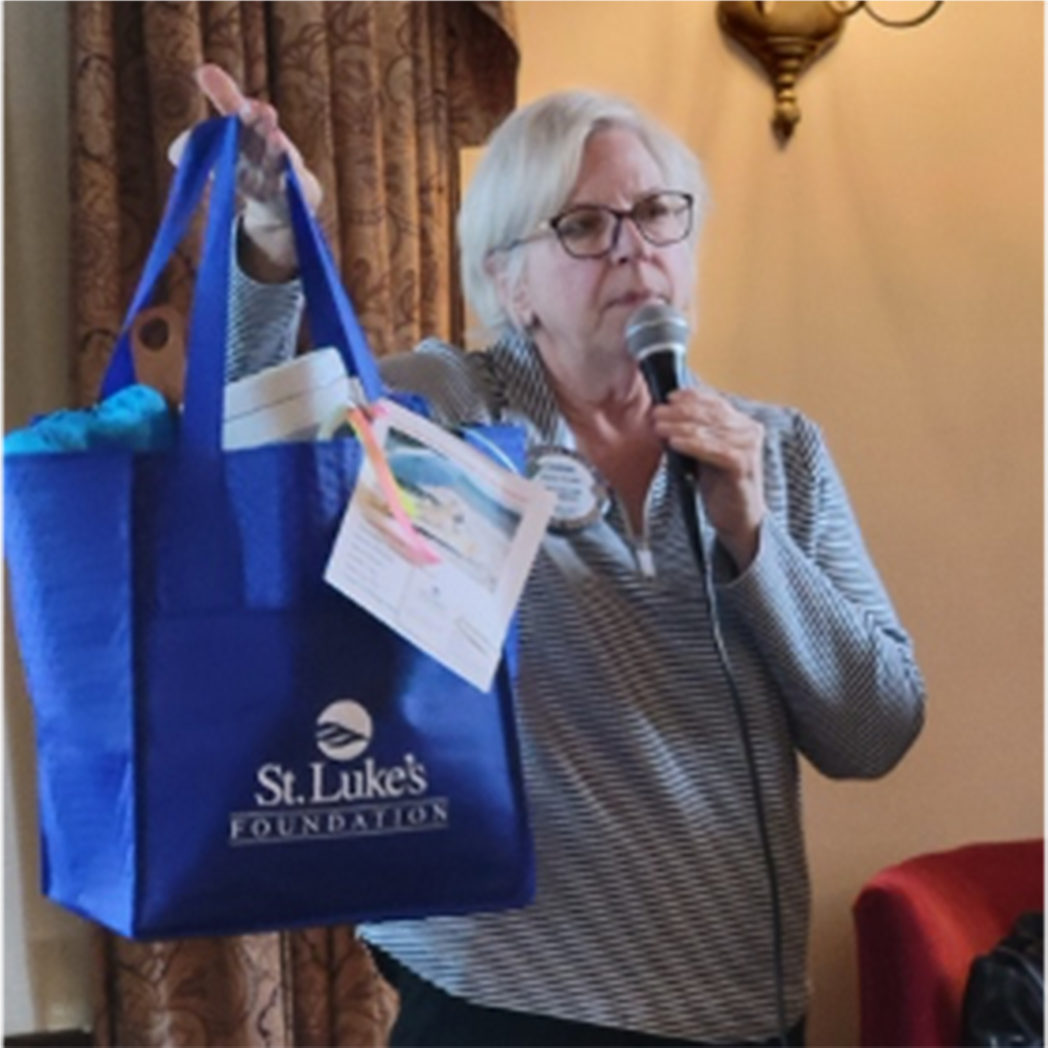 A person holding a blue bagAI-generated content may be incorrect.