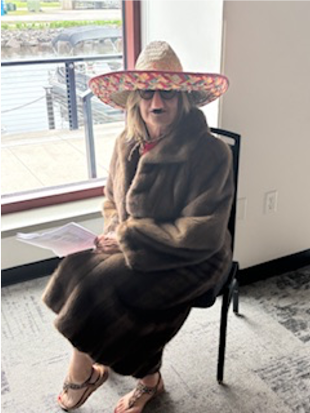 A person wearing a hat and coatAI-generated content may be incorrect.