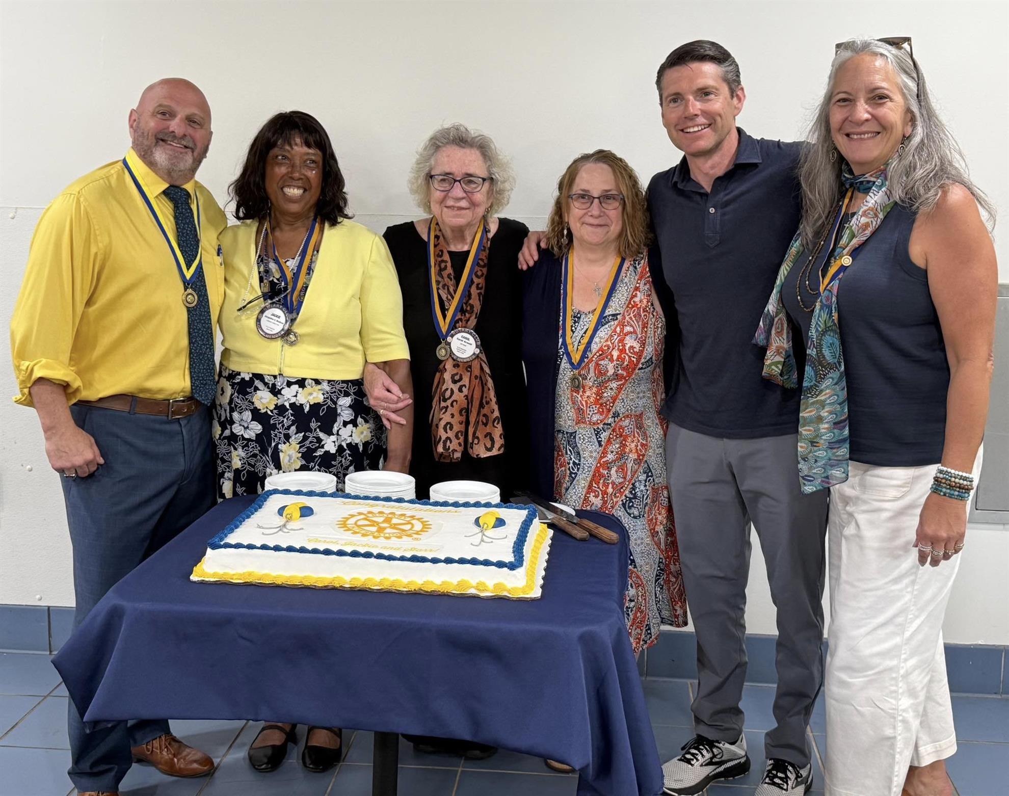 Pictured (L-R): Current club President Ed Kirby, Carol Arnold, Jackie Madison, Starr Burke, NYS Assemblyman Billy Jones, and incoming club President Betsy Vicencio.