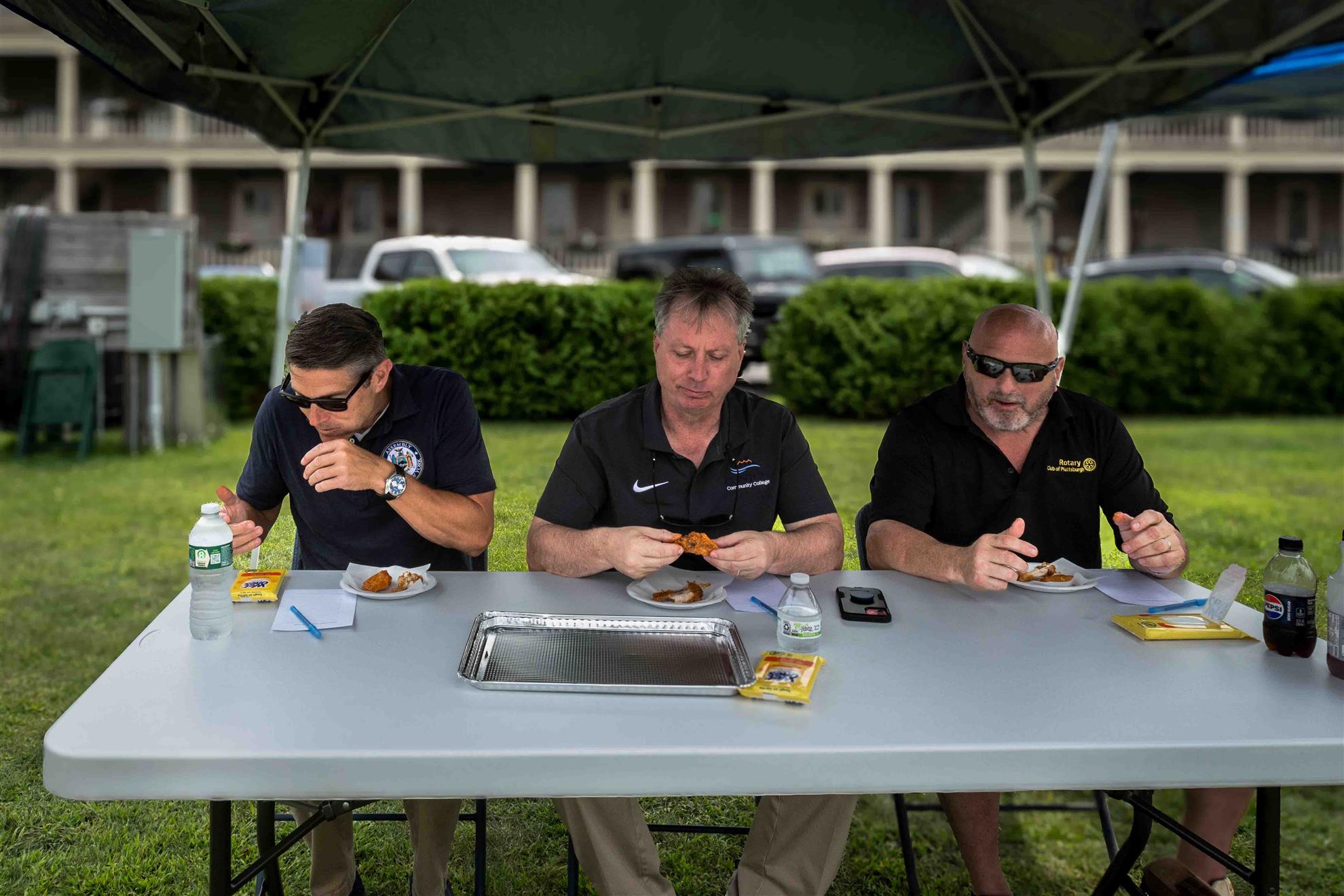 Three members of the Judges Choice Award -- Assemblyman Billy Jones, Clinton Community College Officer-in-Charge Ken Knelly, and Rotary Club President Ed Kirby.