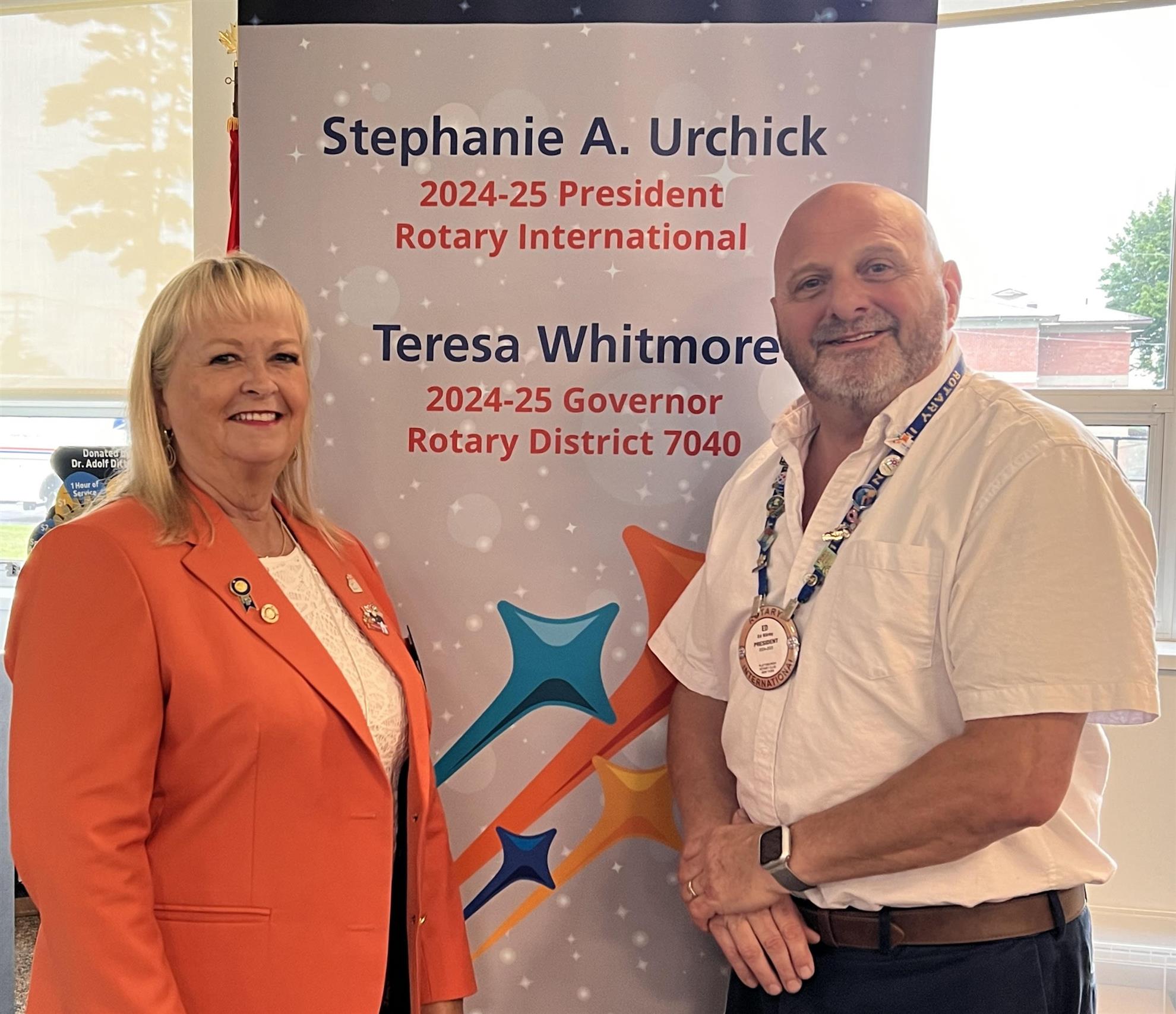 Plattsburgh Rotary Club President Ed Kirby with District Governor Teresa Whitmore