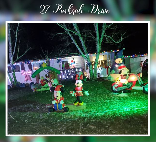 A photo of 27 Parkside Drive decorated with holiday lights.