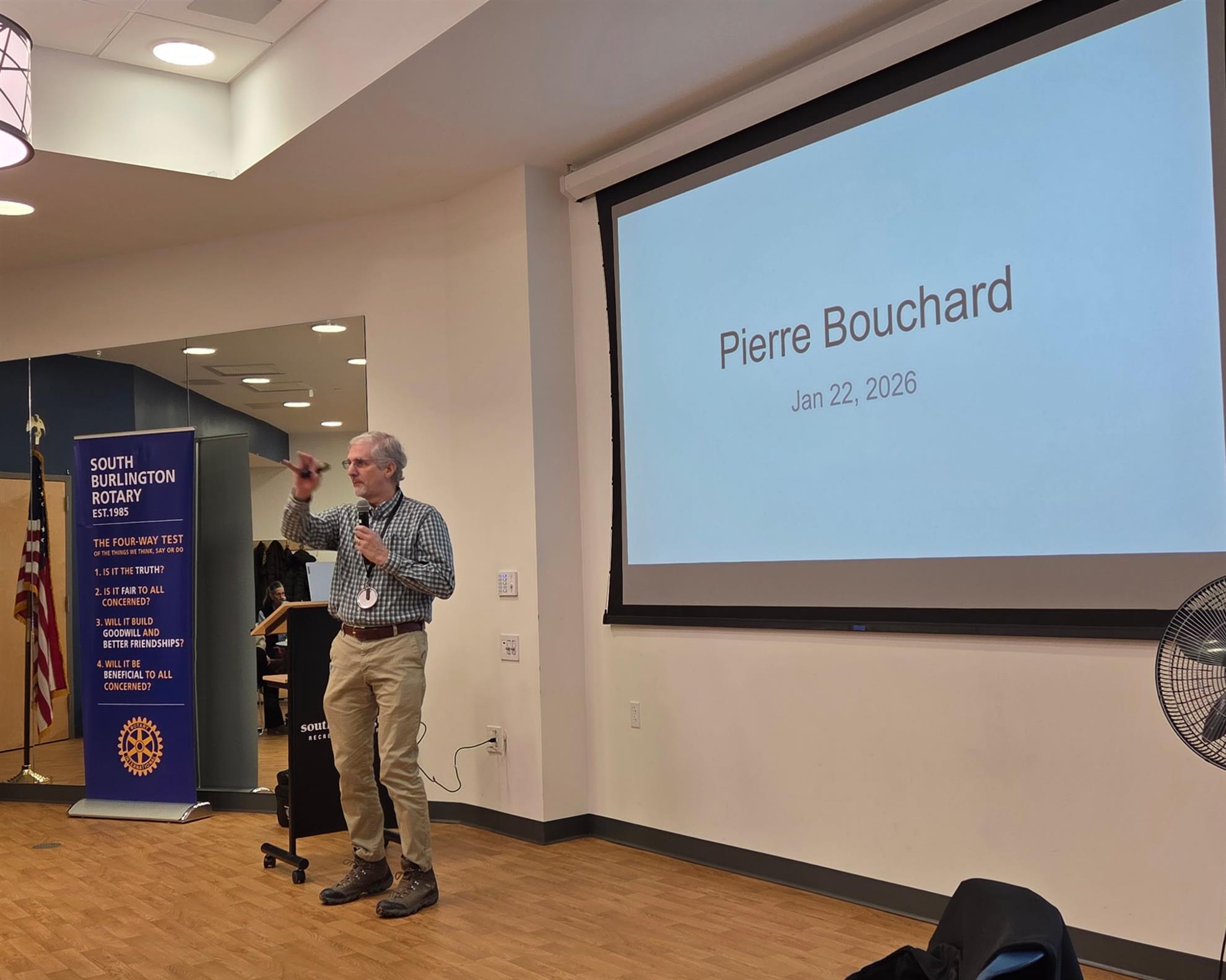 Pierre Bouchard, a new member, gives a classification talk to the club.