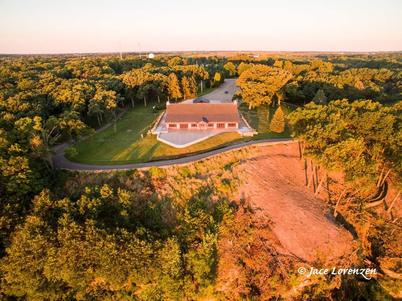 Arial-view-of-Lodge-and-trees-from-Lake-Clinton.jpg