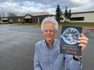 Rotarian Michael Archer delivering dictionaries to third graders!