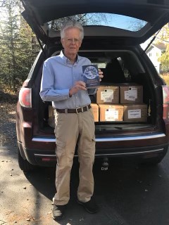 Rotarian Michael Archer delivering dictionaries to third graders!