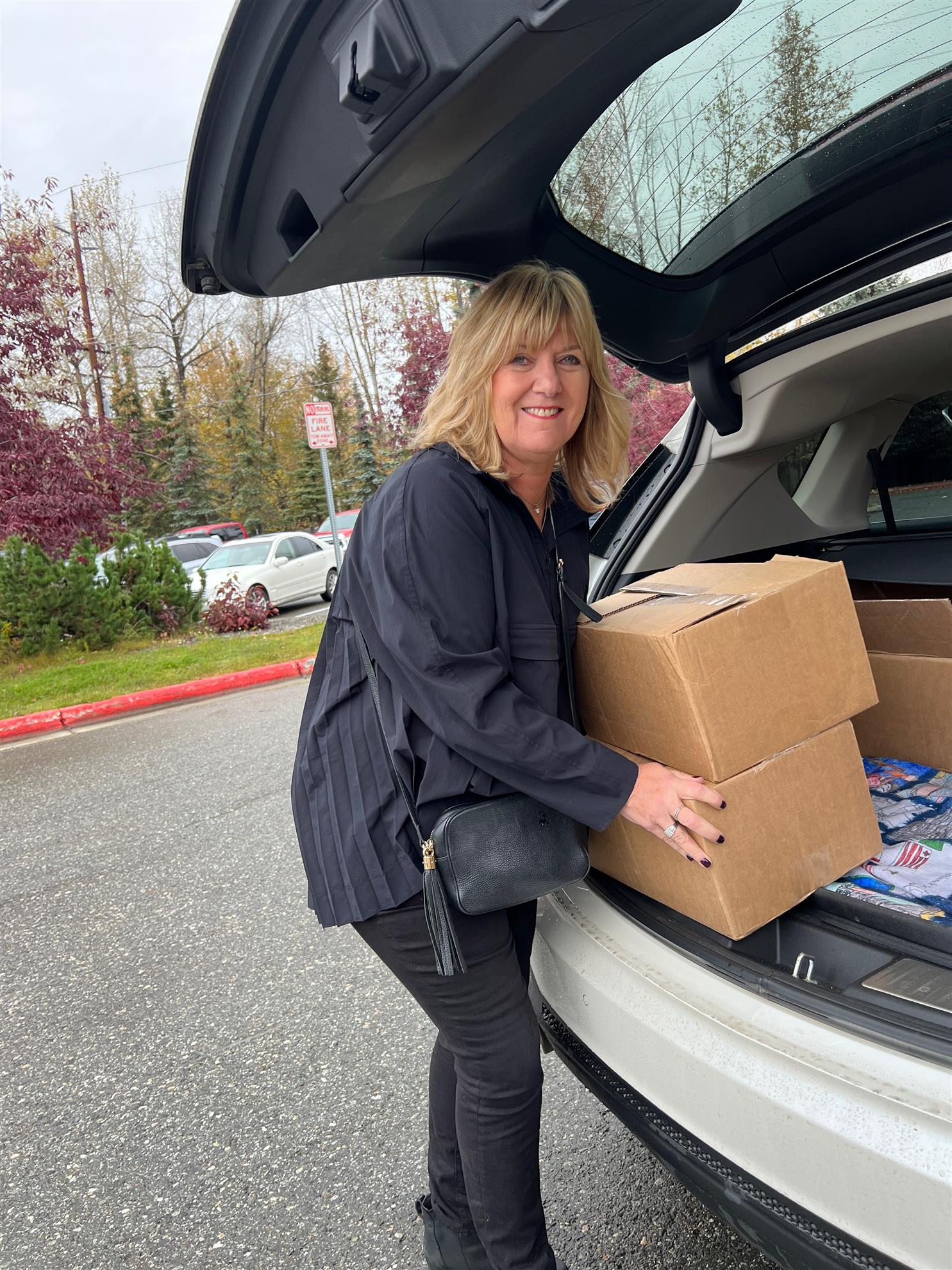 Load 'em out!  ASR President Denise on the dictionary delivery trail!