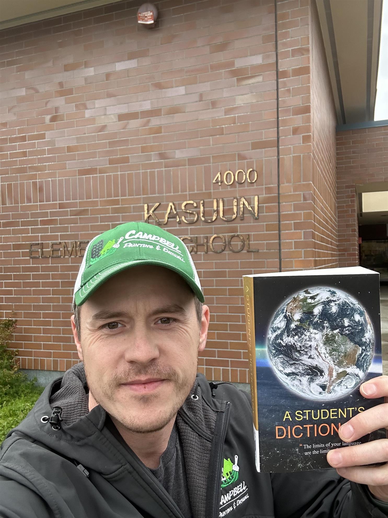 Rotarian Ben Campbell on the trail delivering dictionaries to ASD third graders!