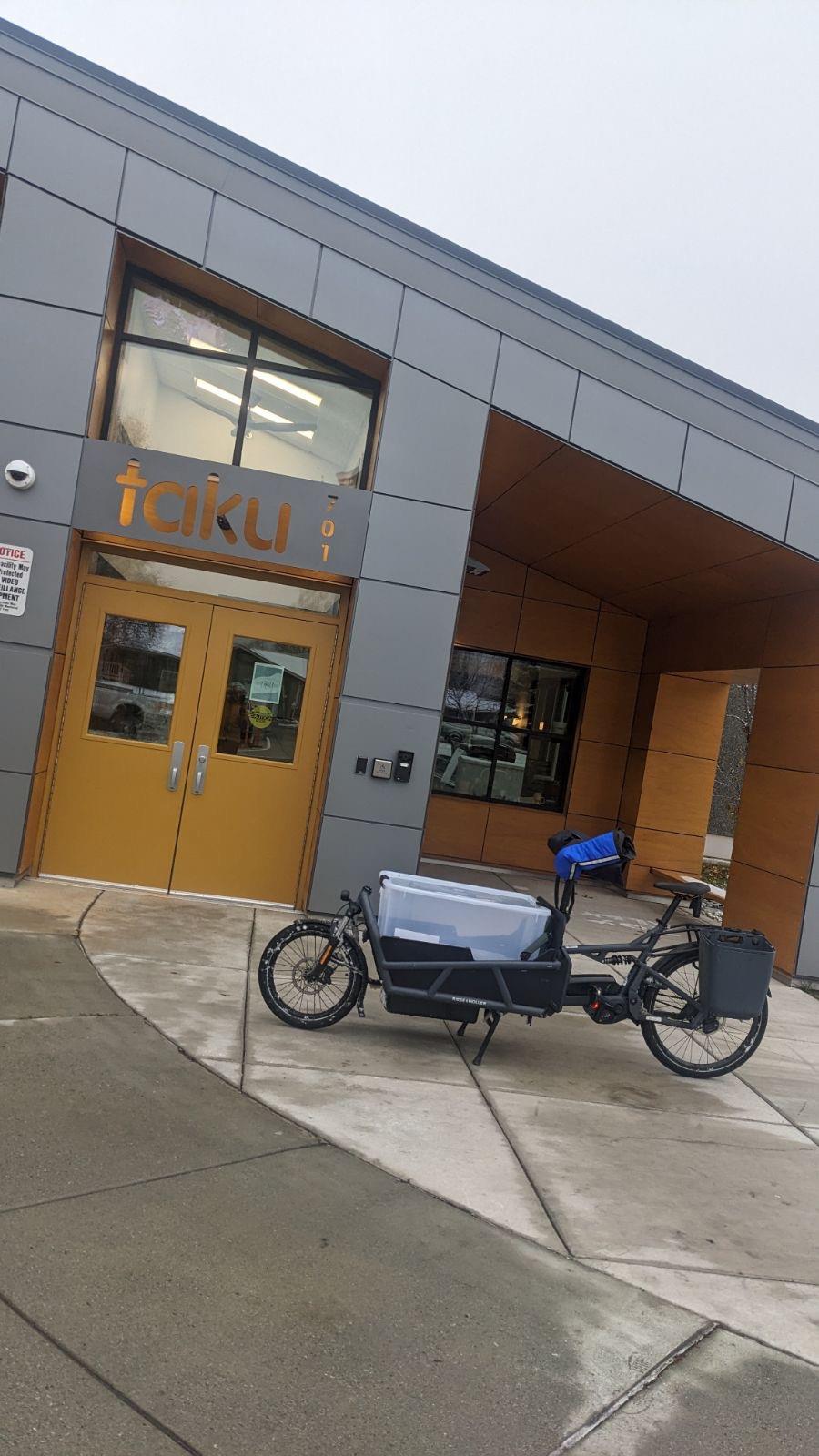 Rotarian Justin Therriault delivers dictionaries on his cargo bike!