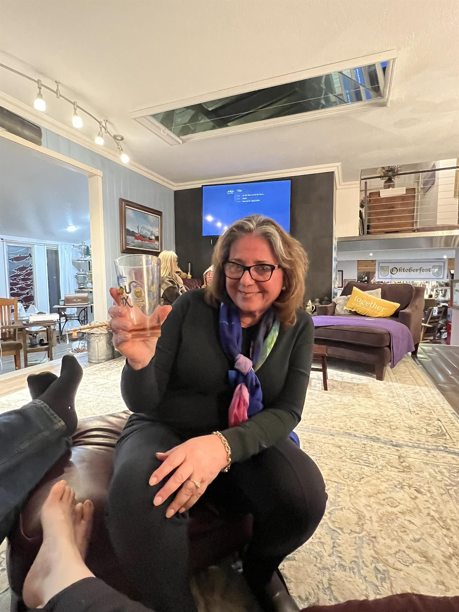 Rotarian Terri Hall celebrating Octoberfest at past DG Mike Ferris's house.