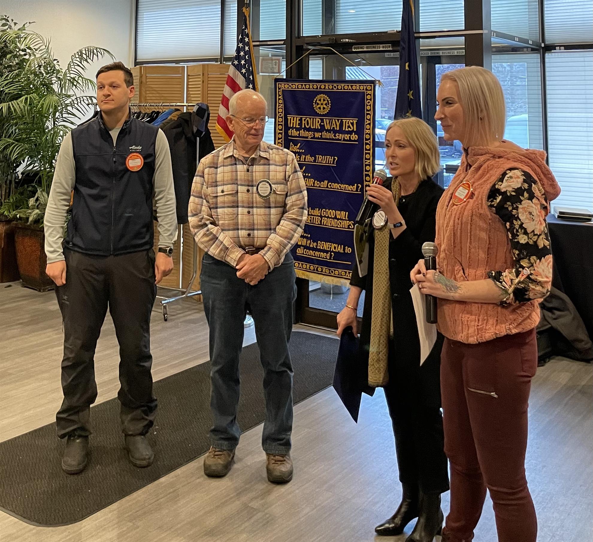 Justin Therriault and Chuck Szopa receive their Paul Harris awards; Justin also got his blue badge!