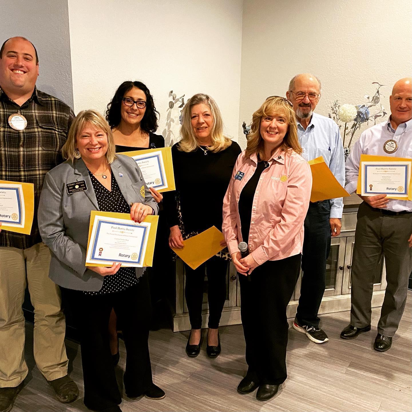 Paul Harris Society Members are recognized. Missing in photo is Cindy Vanden Berg