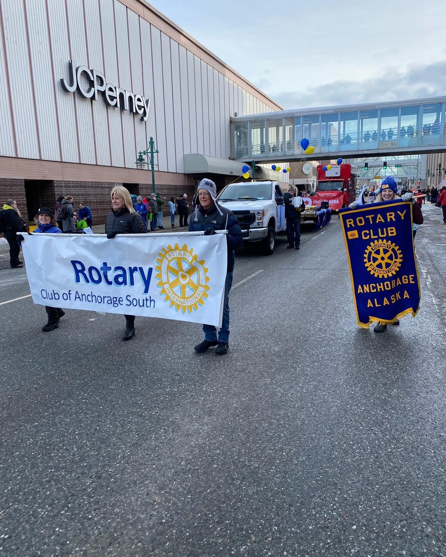 Sue, Denise & Michael showing off our new banner! Claudia is all smiles!
