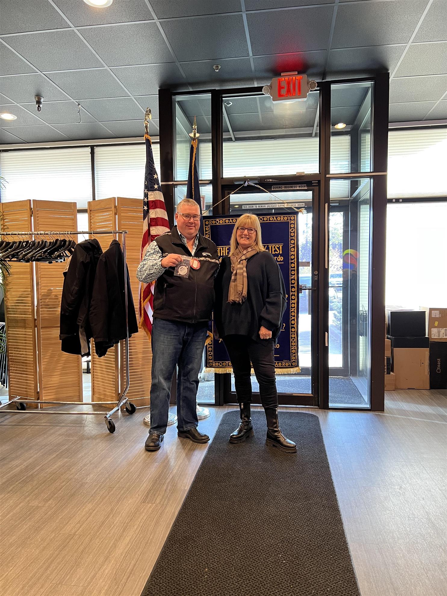 President Denise Kipke awards Adam Turner his Blue Badge, making him a full member of ASR!