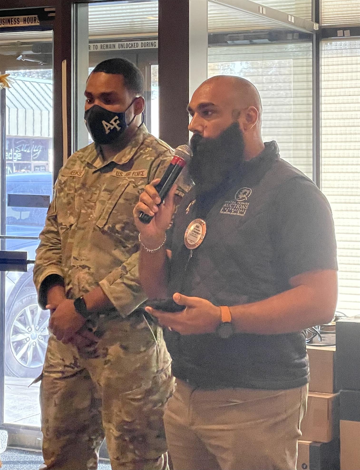 Past President Dan Newman presents Air Force Officer Demonte Meeks to Anchorage South Rotary!