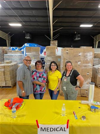 Packing medical aid boxes for Ukraine 