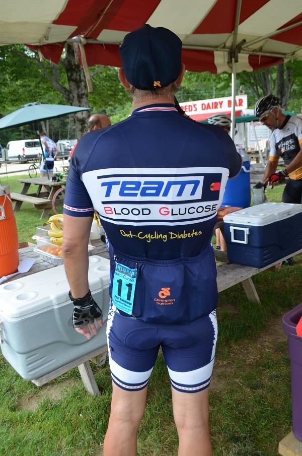 cyclist's shirt showing reason for the ride