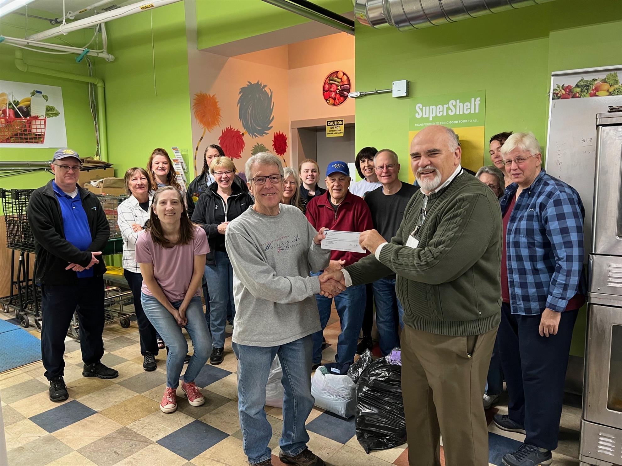 COL Rotarians pack food and deliver donation to CES Food Shelf in Minneapolis