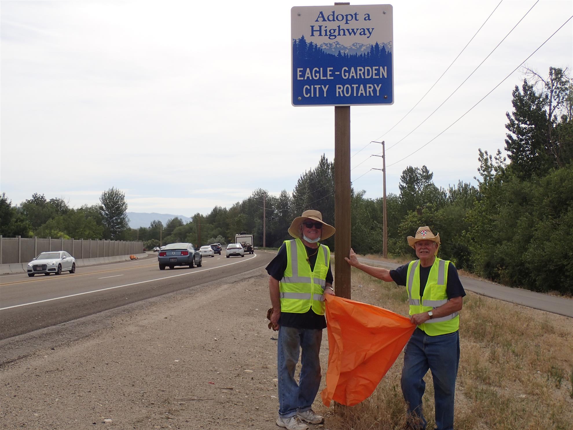 Picking up trash along the highway